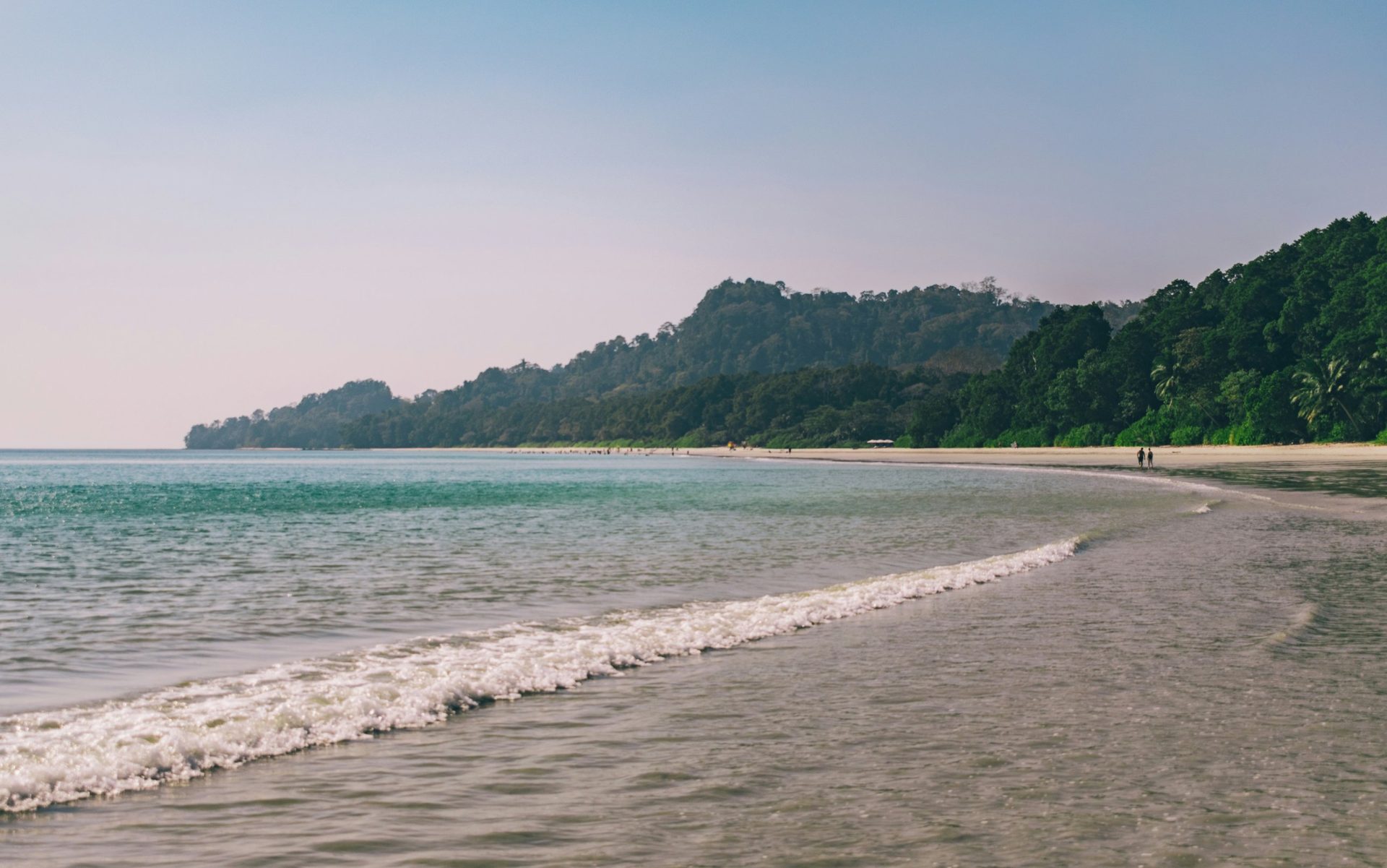Curved Andaman shoreline with forested hills